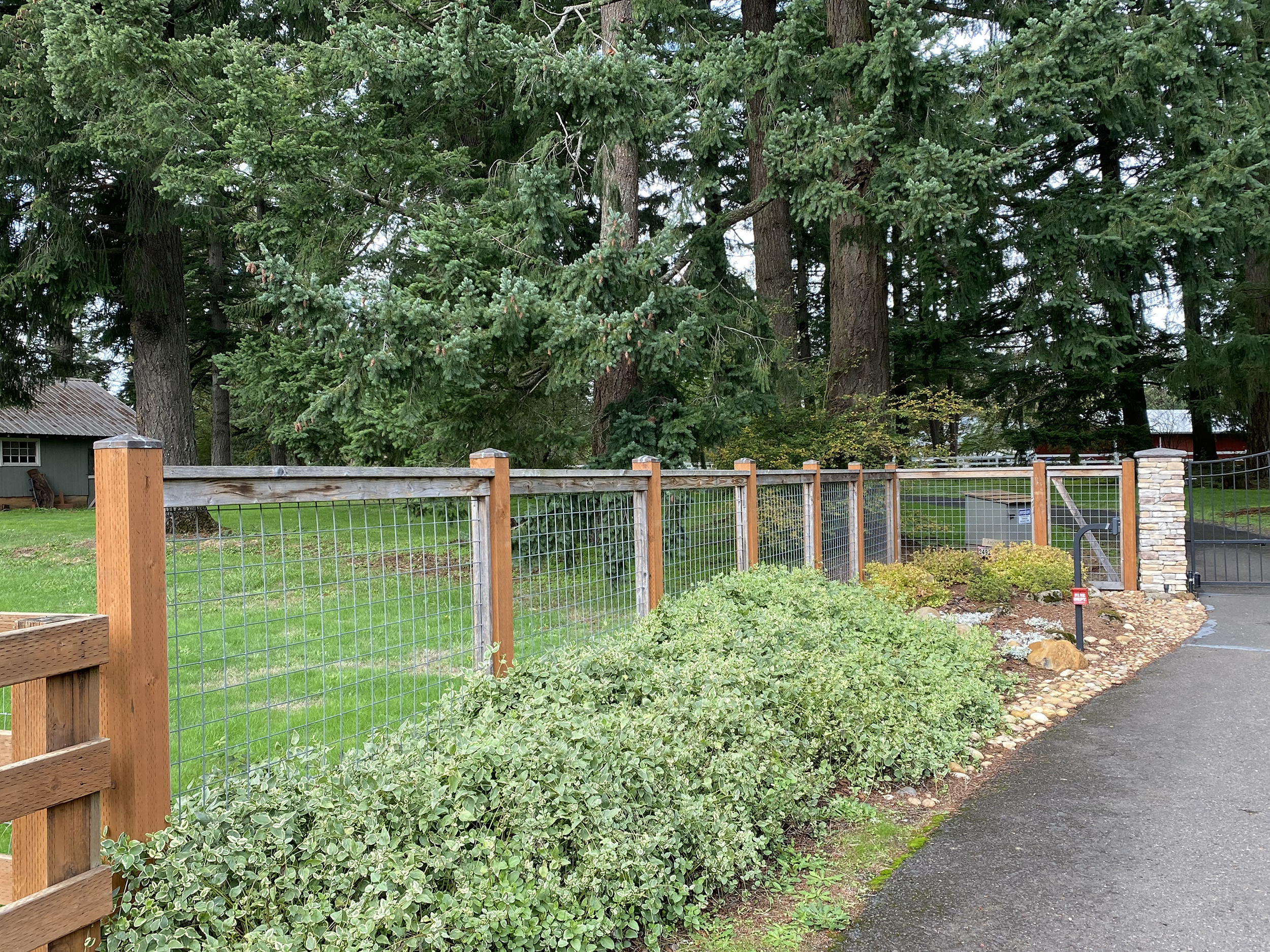 The Best Fence Company Wire and Wood fence